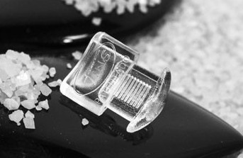 Aplique ceñidor de la firma Tins