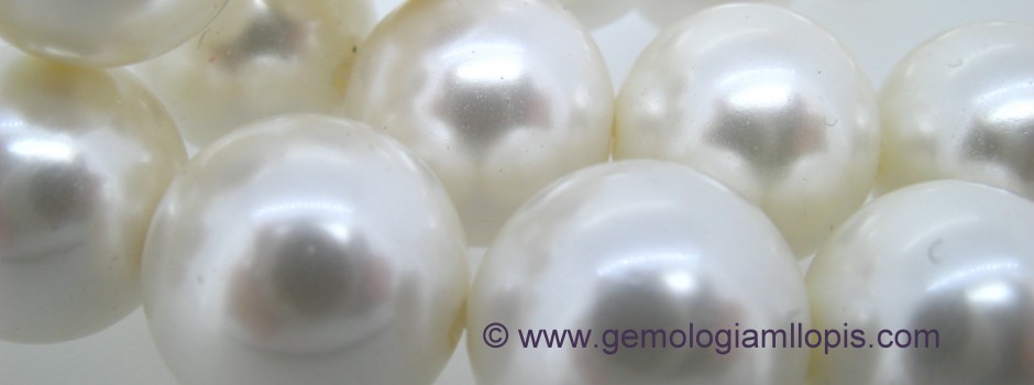 Perlas de imitación con núcleo de concha