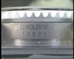 Numero de referencia 126710 de una réplica de Rolex,n el lateral de la caja