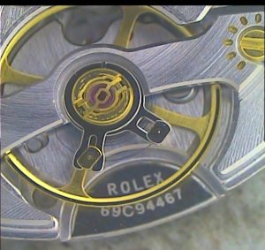 Volante, raqueta y porta pitón. Imitación de máquina Rolex