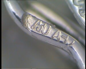 Punzón de ley de metal